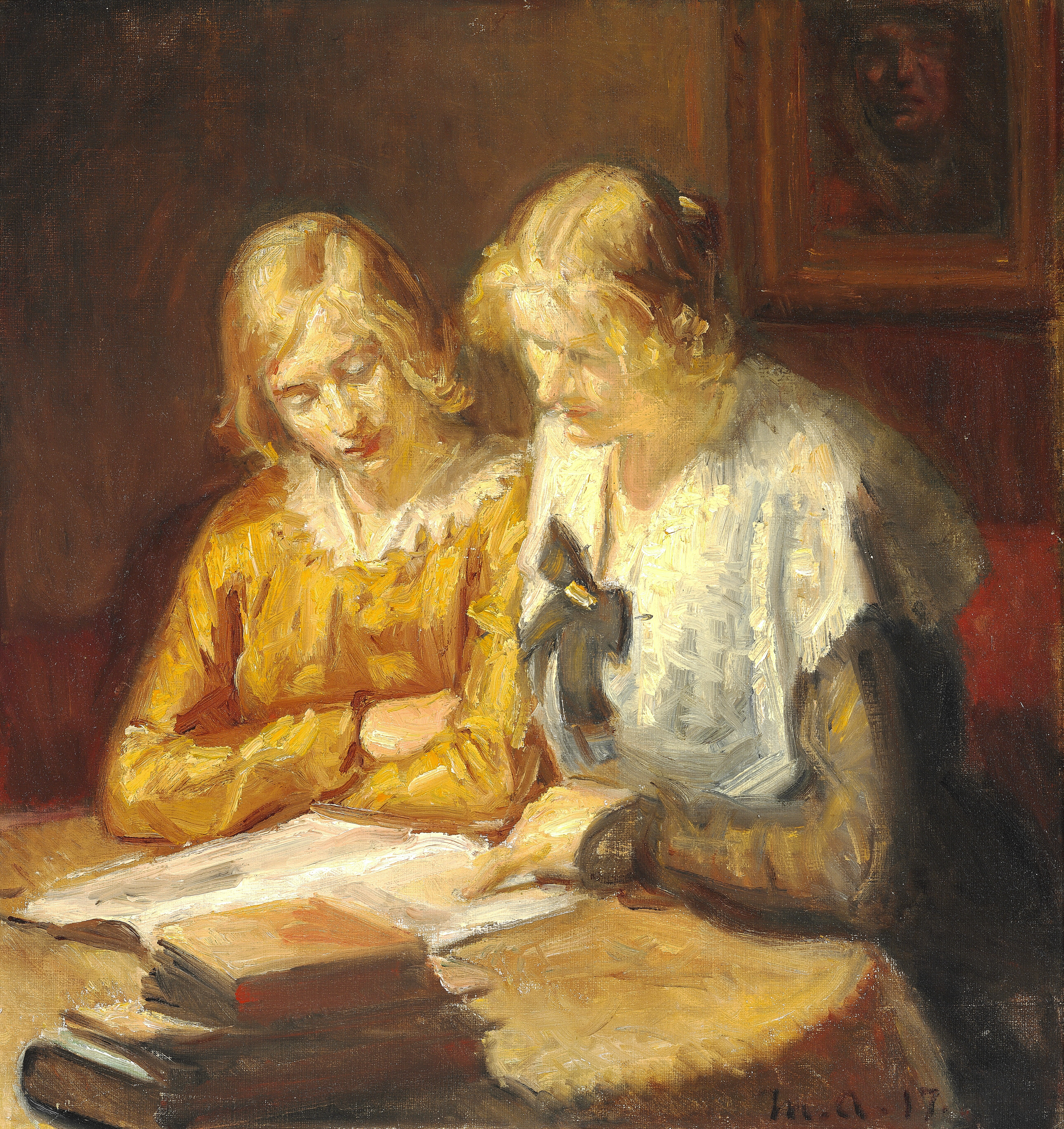Deux jeunes femmes assises à table lisent un livre - Michael Peter Ancher