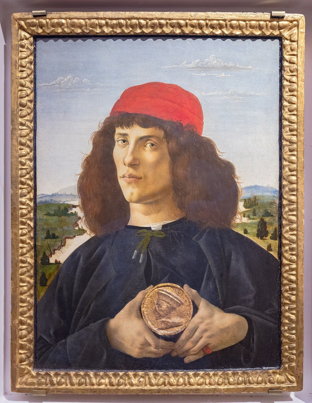 Porträt eines Mannes mit Medaille von Cosimo dem Alten - Sandro Botticelli