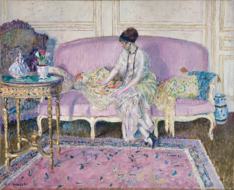 Sitzende Frau auf einem Sofa im Inneren - Frederick Carl Frieseke