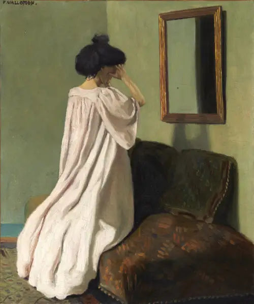 Gabrielle Vallotton kniend vor einem Spiegel auf der Couch in der Werkstatt in der Rue des Belles-Feuilles - Félix Vallotton