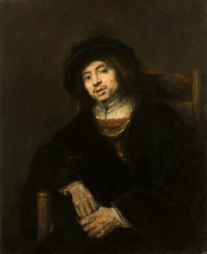 Porträt eines jungen Mannes in einem Sessel - Rembrandt