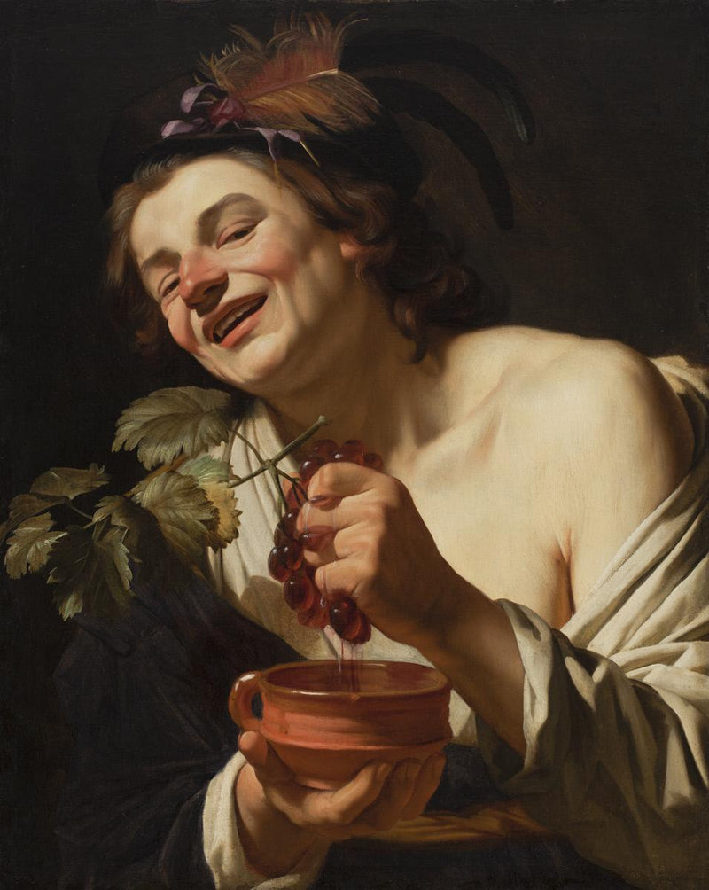 Junge lachende Mann, der Trauben drückt - Gerrit van Honthorst
