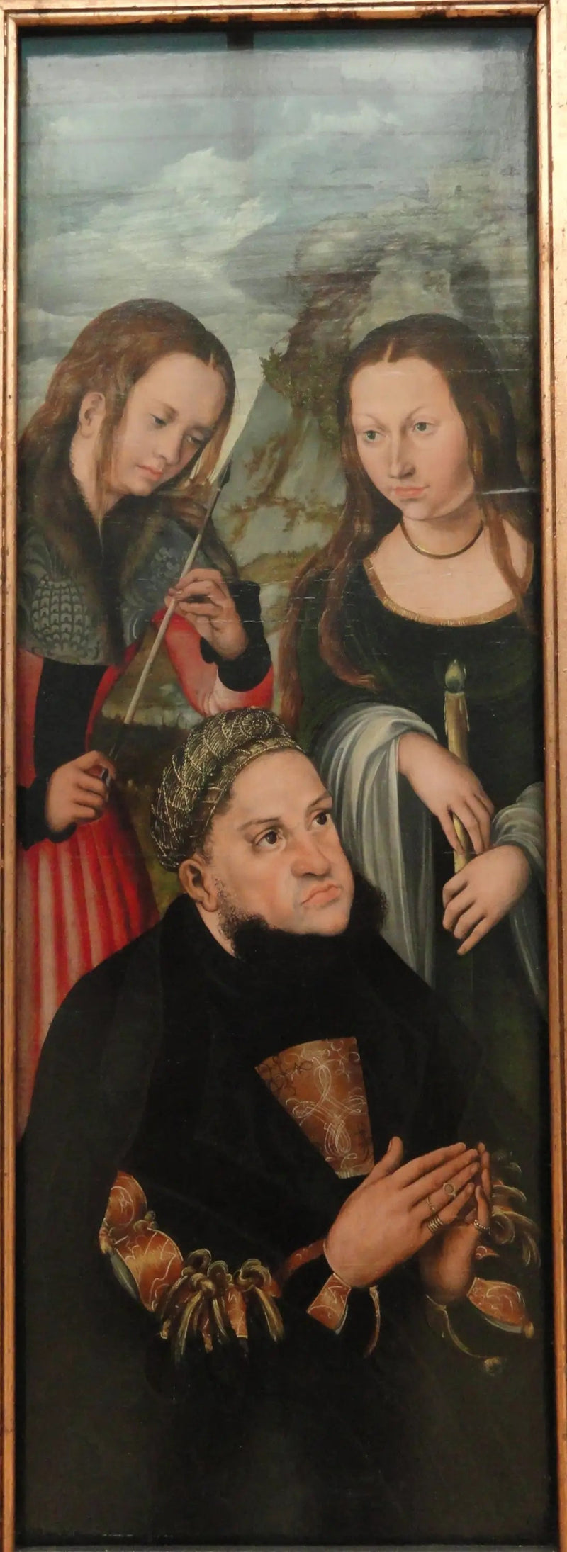 Der Wähler Friedrich der Weise von Sachsen (1463-1525) mit den heiligen Ursula (links) und Genoveva (rechts) - Lucas Cranach der Ältere