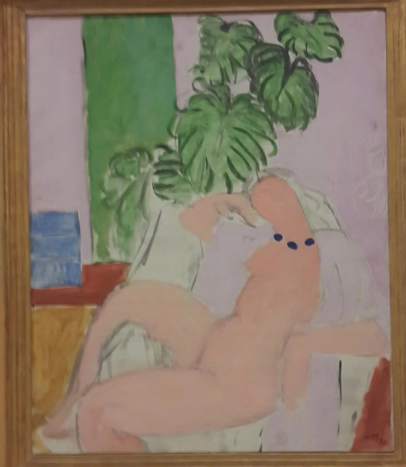 Nackt in einem Sessel, grüne Pflanze - Henri Matisse
