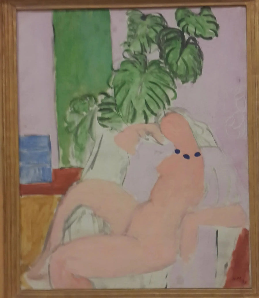 Nackt in einem Sessel, grüne Pflanze - Henri Matisse