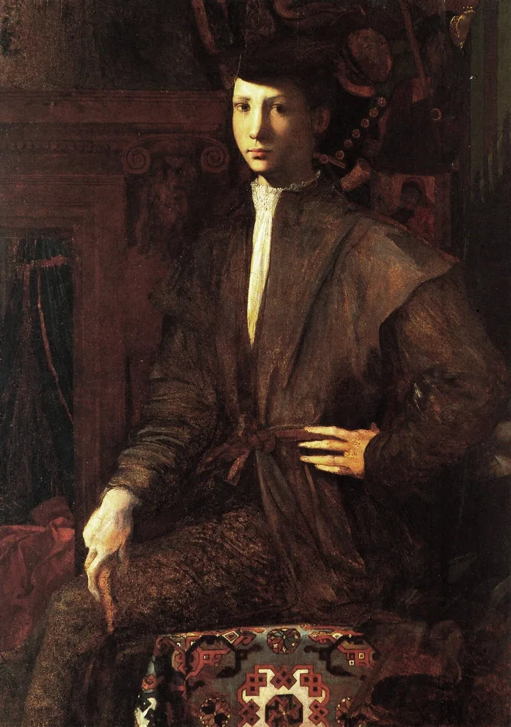 Porträt eines jungen Mannes, der auf einem Teppich sitzt - Rosso Fiorentino