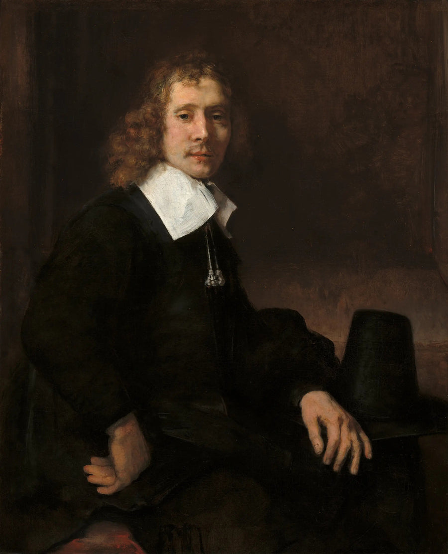 Ein junger Mann sitzt an einem Tisch (vielleicht Govaert Flinck) - Rembrandt