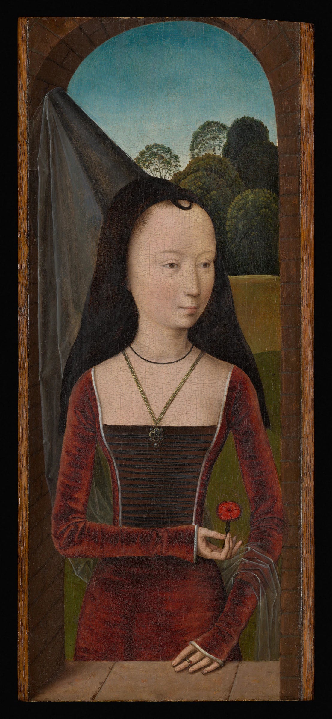 Young Woman with a Pink - Hans Memling